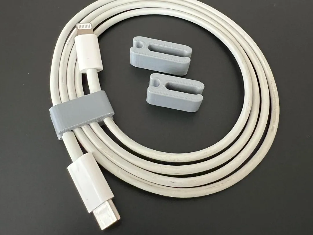 minimalistic apple cable organizer / cable clip