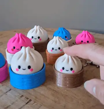 Cute dumpling fidget clicker toy