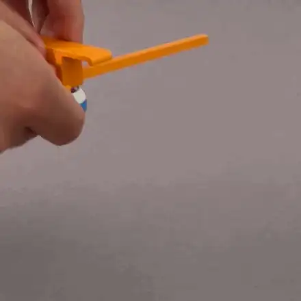 Self-Flipping Spinning Top