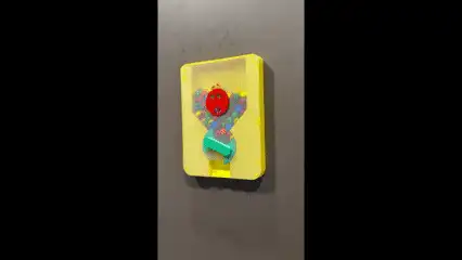 Wall-Mounted M&M's Candy Dispenser