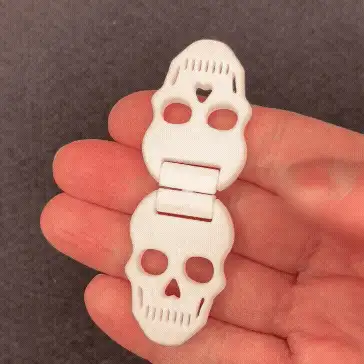 Skull Slider + Flip Fidget Skeleton Toy