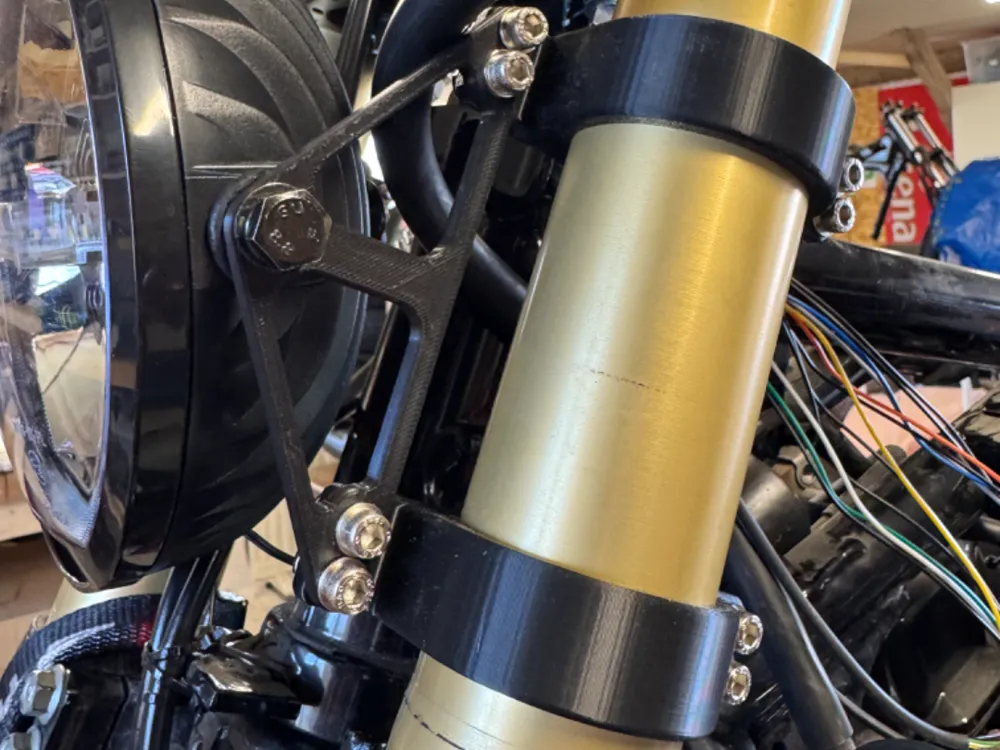 Headlight mount for USD motorcycle fork