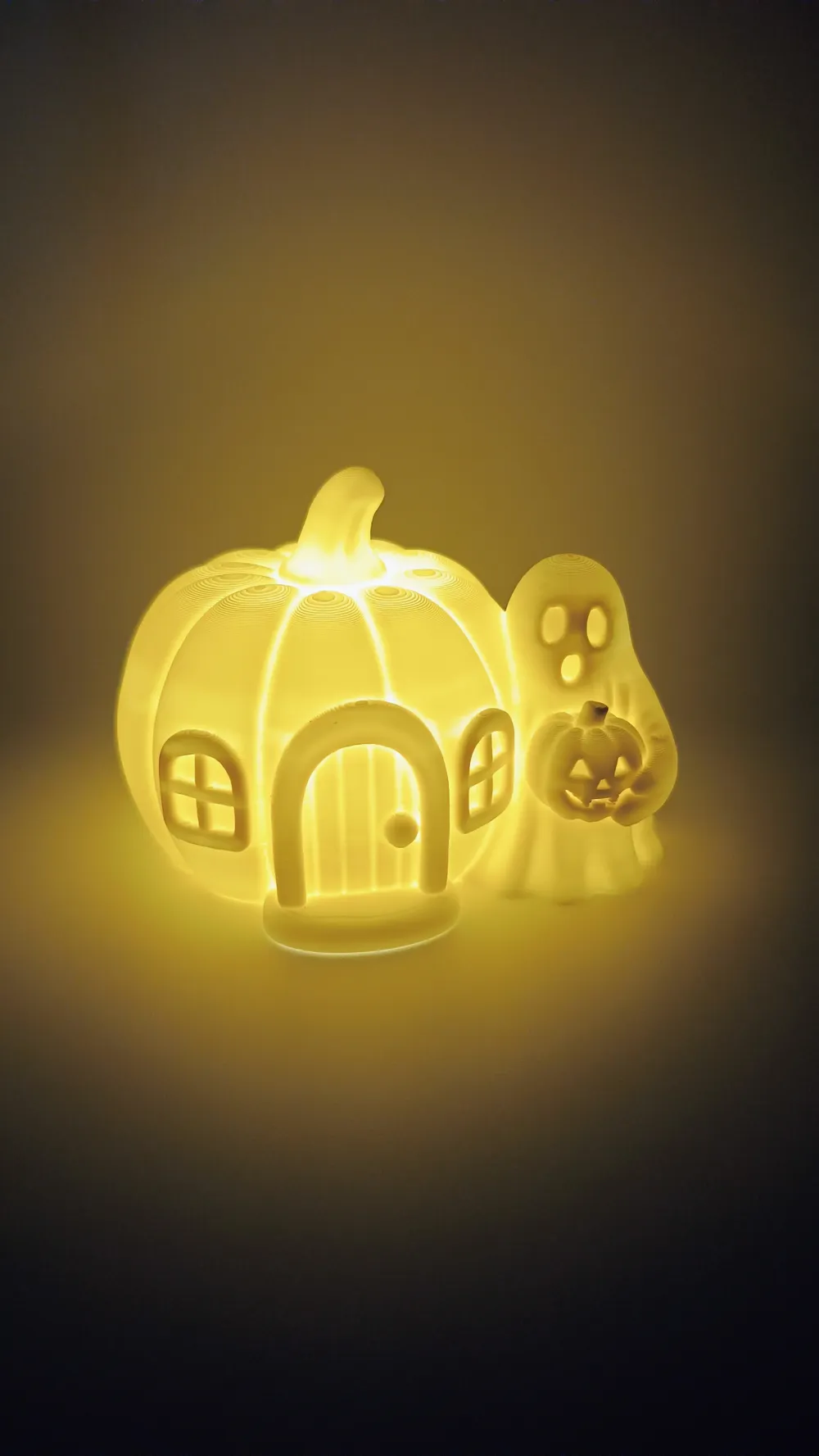 Glowing Pumpkin House with Ghost Visitor, photo 2 of 4 - Glowing Pumpkin House with Ghost Visitor Household
