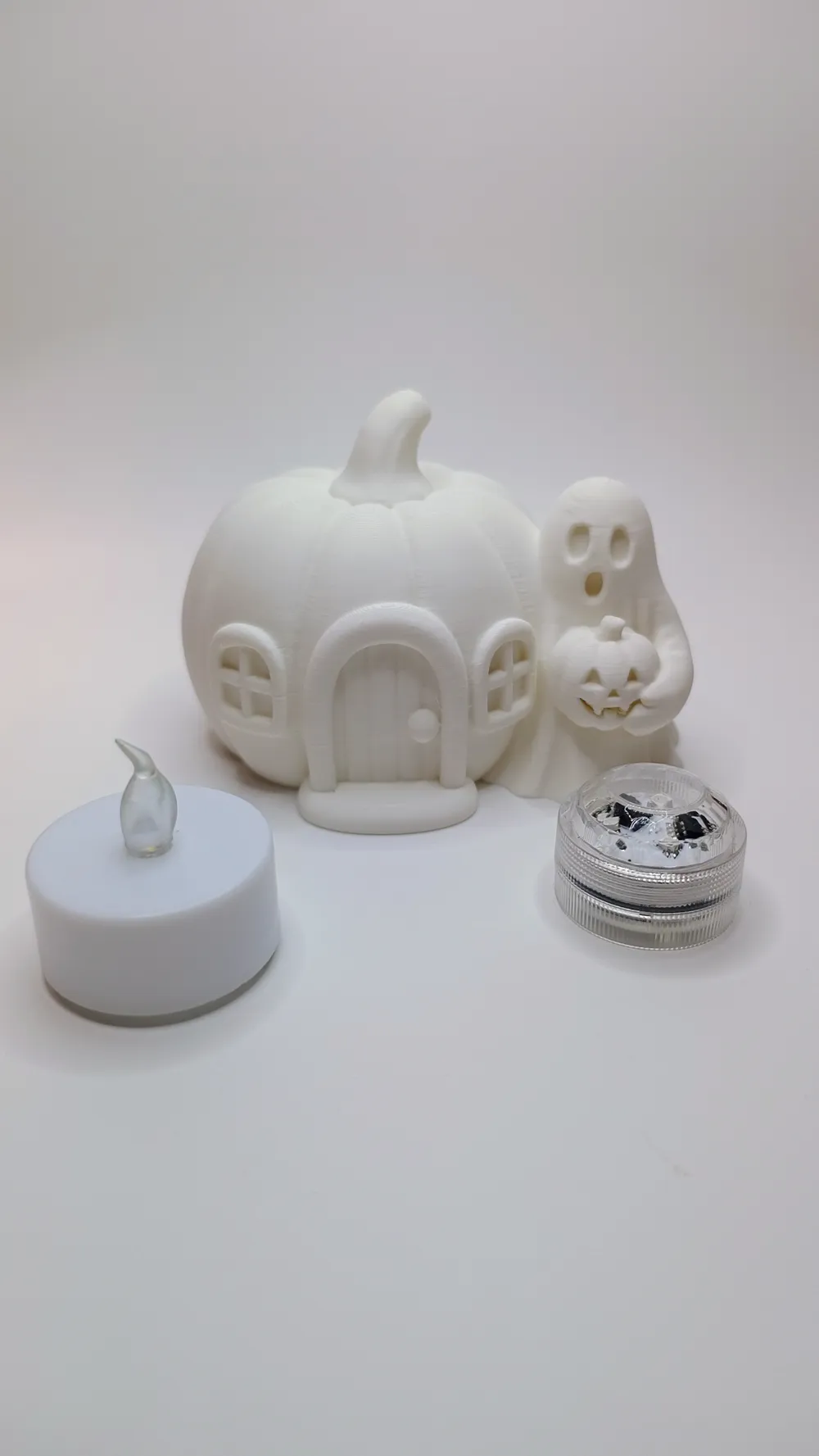Glowing Pumpkin House with Ghost Visitor, photo 3 of 4 - Glowing Pumpkin House with Ghost Visitor Household