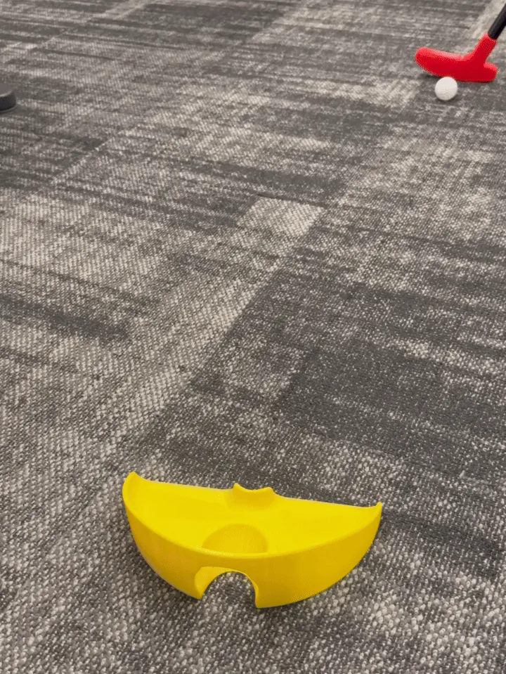 Mini golf hole drive obstacle