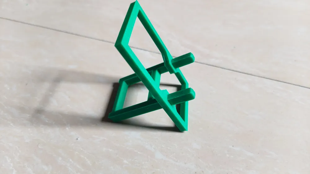 Spliced ​​mobile phone holder, photo 2 of 4 - Spliced ​​mobile phone holder Household