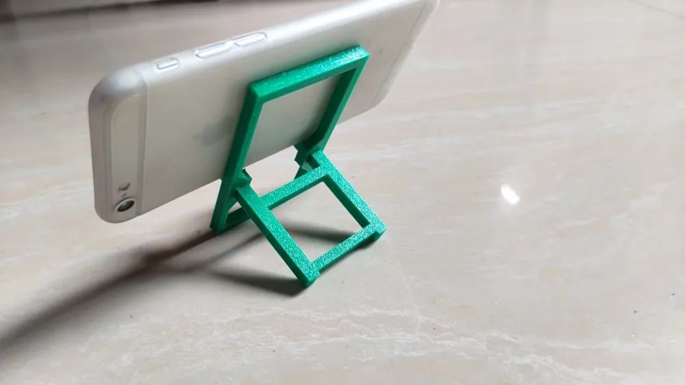 Spliced ​​mobile phone holder, photo 4 of 4 - Spliced ​​mobile phone holder Household