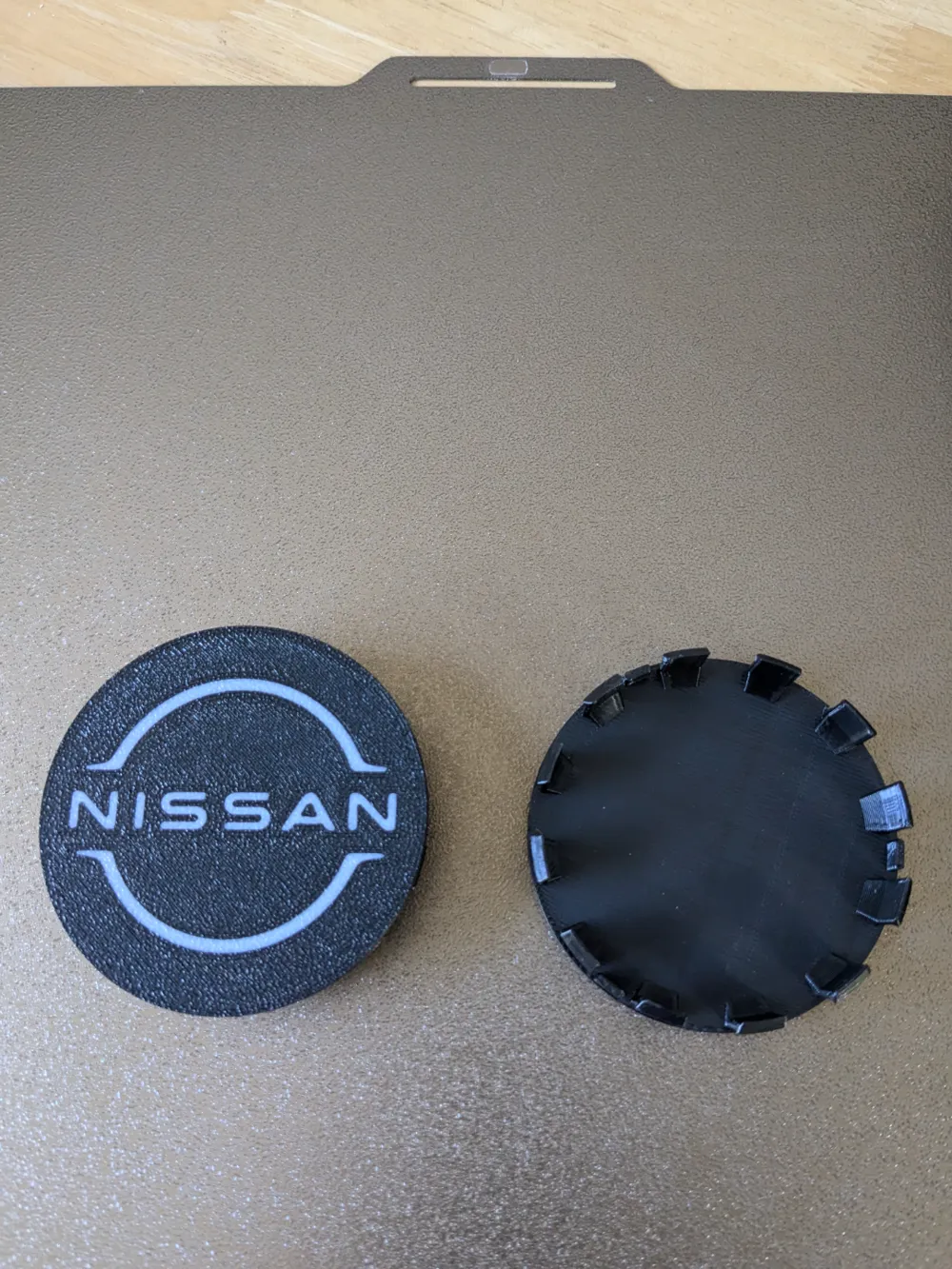 Nissan Frontier Wheel Center Cap, photo 2 of 4 - Valve Caps & Wheel Accessories, Car & Vehicle