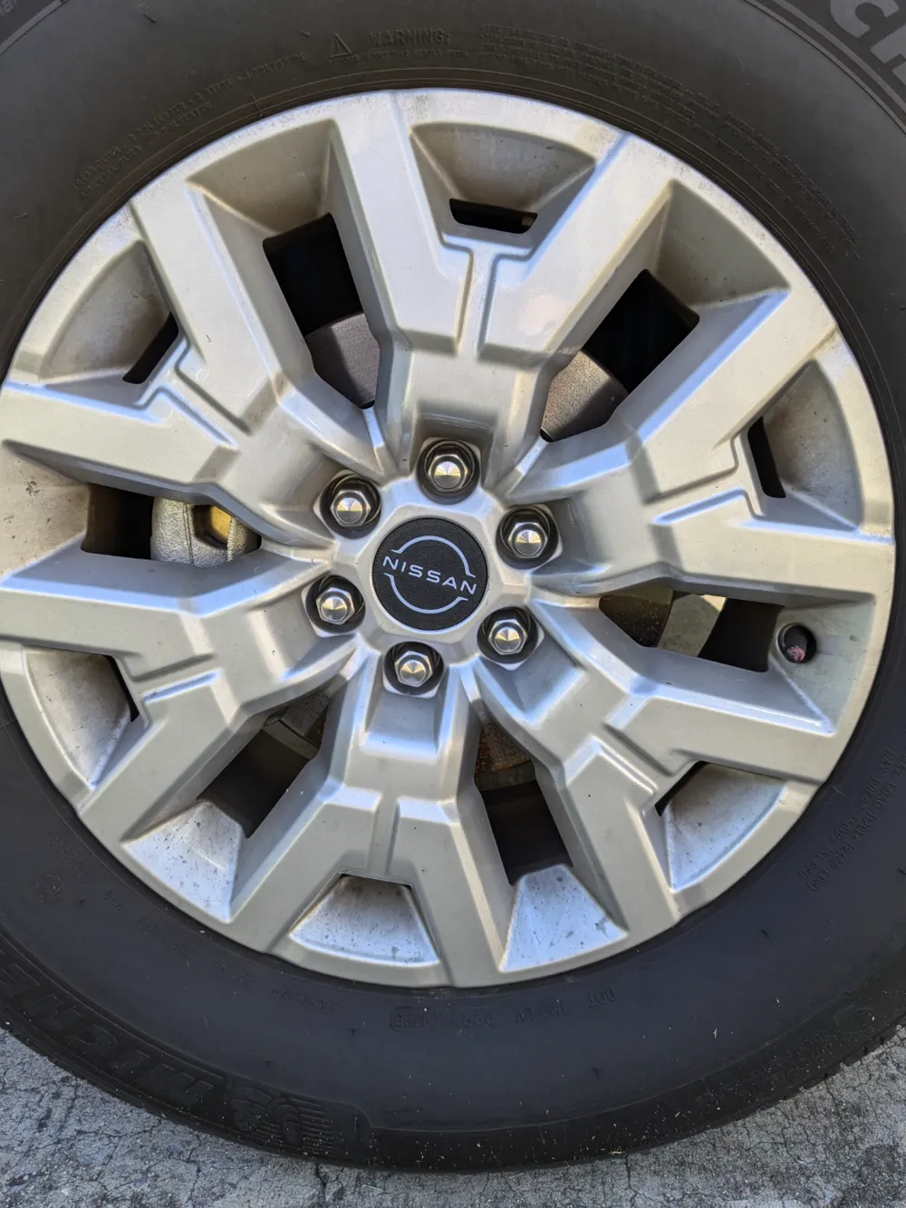 Nissan Frontier Wheel Center Cap, photo 3 of 4 - Valve Caps & Wheel Accessories, Car & Vehicle
