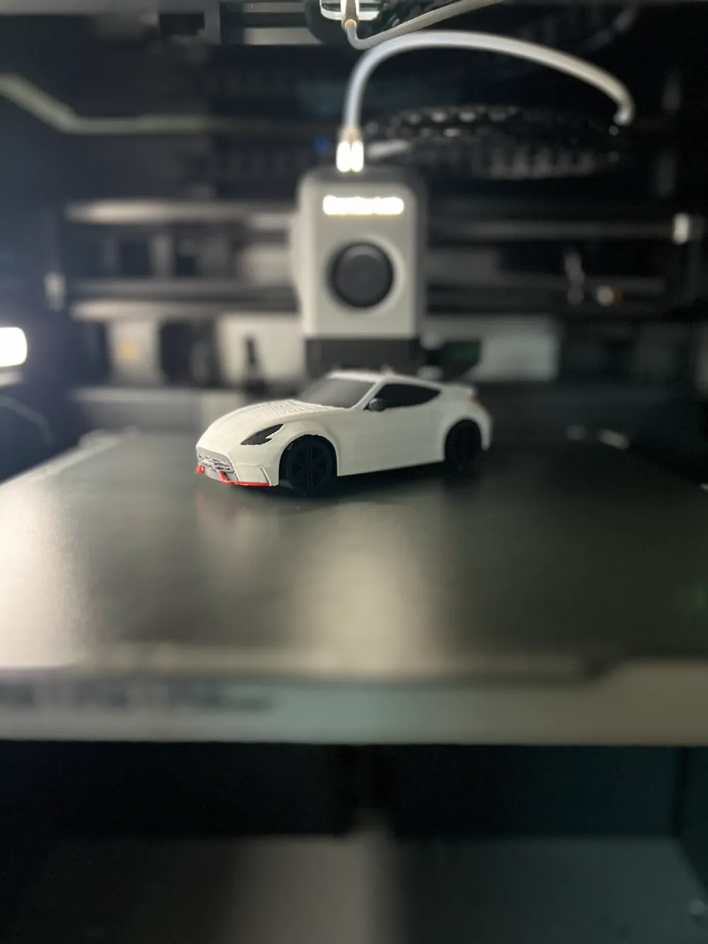 Nissan 370Z Nismo [Moving Wheels], photo 3 of 4 - Valve Caps & Wheel Accessories, x1c