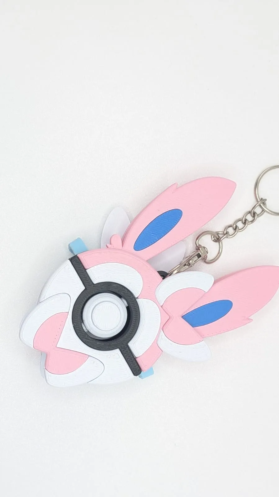 Sylveon Inspired PokeBall Spin Keychain Fidget, photo 3 of 4 - Sylveon Inspired PokeBall Spin Keychain Fidget Toys & Games