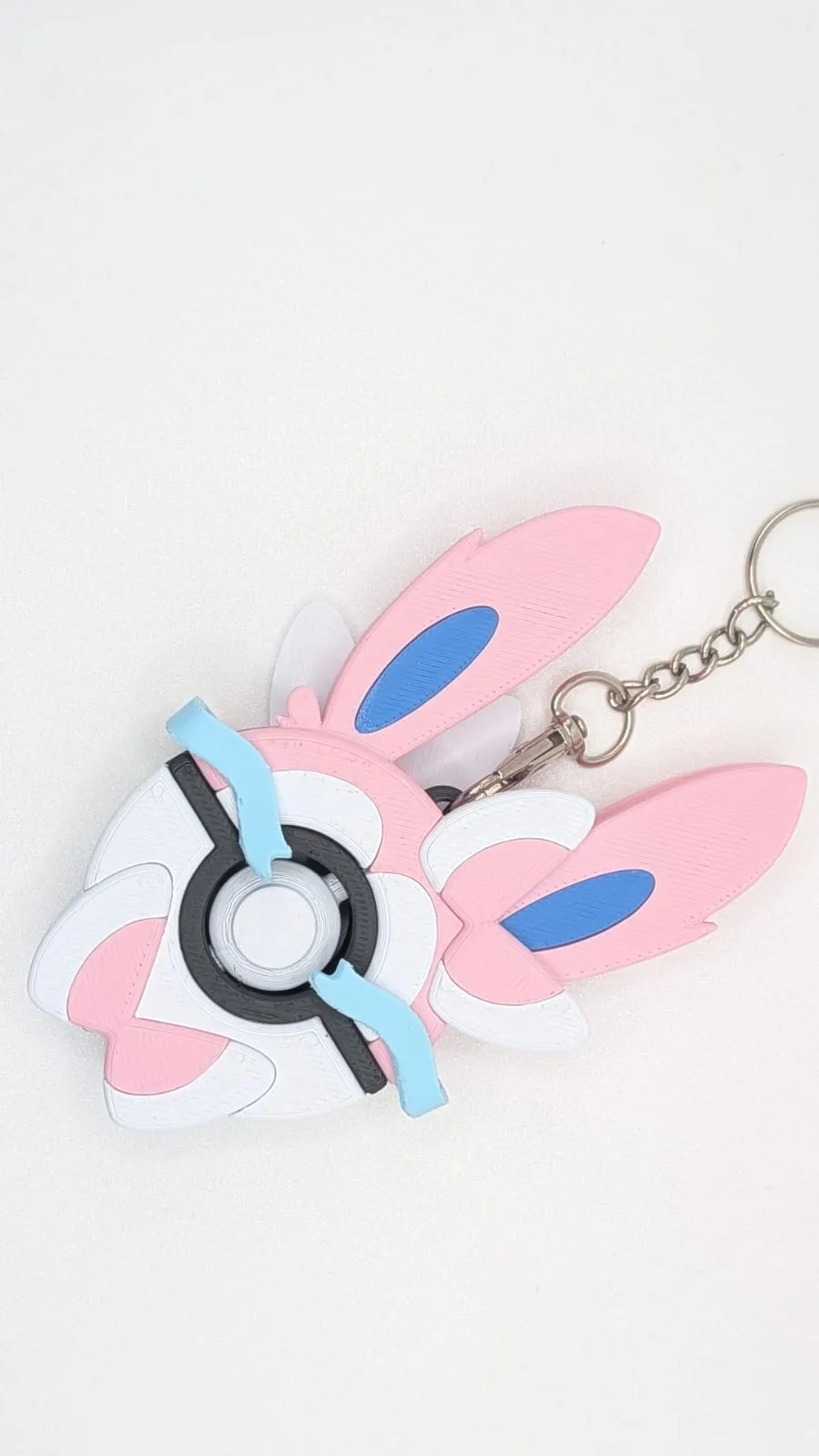 Sylveon Inspired PokeBall Spin Keychain Fidget, photo 4 of 4 - Sylveon Inspired PokeBall Spin Keychain Fidget Toys & Games