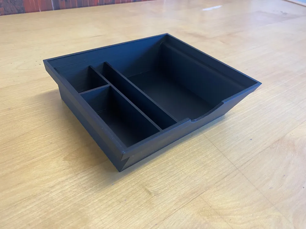 Tesla Model Y 2025 storage box center console.