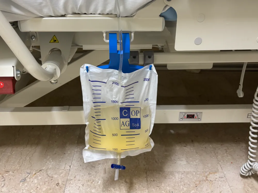 Supporto sacca/busta urine catetere vescicale