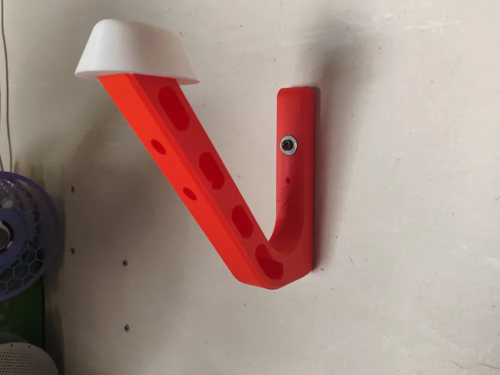 Wall helmet holder